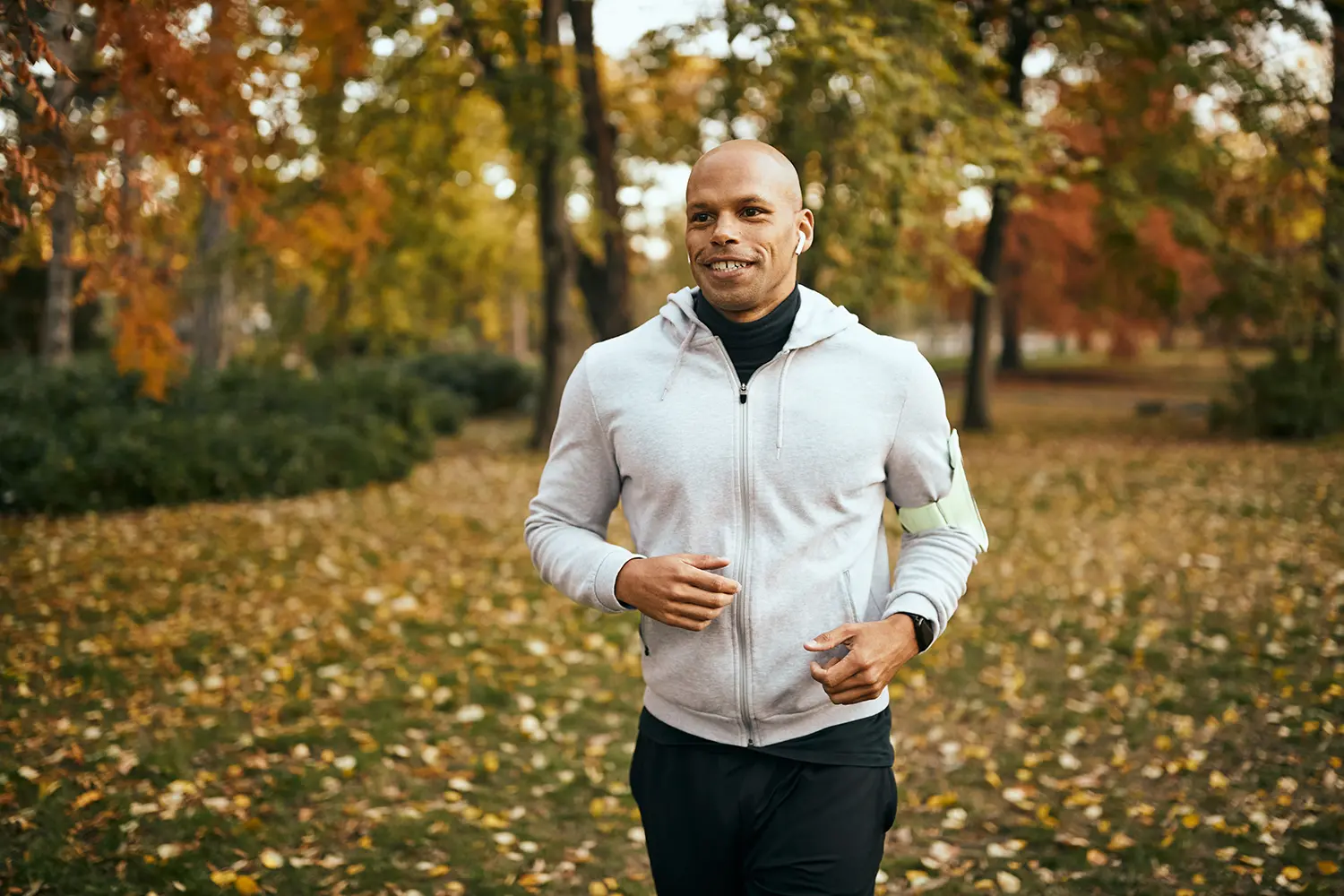 man going on a run smiling